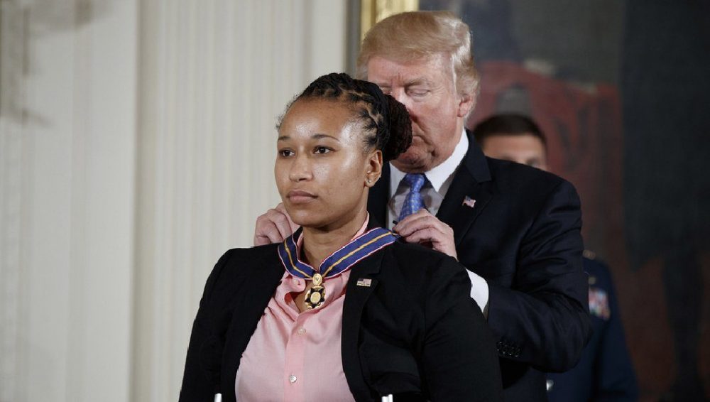 Crystal Griner receiving the Medal of Valor from President Trump