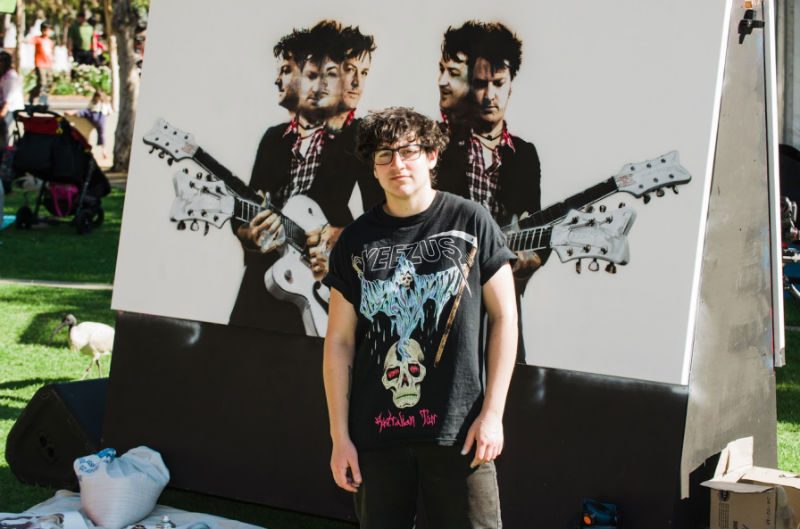 Chris Cheney with the winning artwork 23rd Key Unlocks New Ground in Artistic World